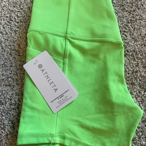 ATHLETA Salutation stash pocket II 5” short NWT neon Aloe - Picture 12 of 12